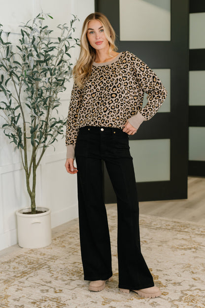Front view of Lilith Leopard Print Pullover showing round neckline and cozy sweater knit.