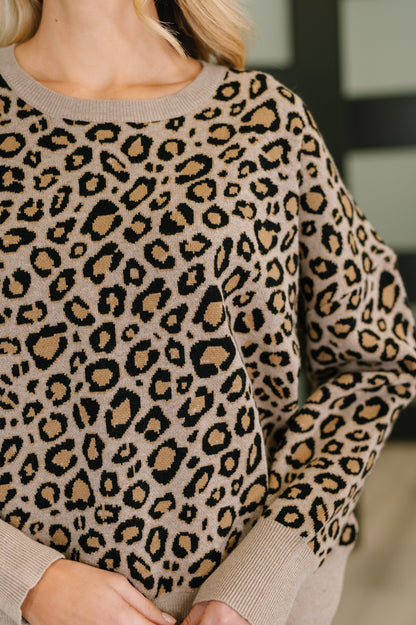 Close-up of Lilith Leopard Print Pullover showing ribbed neckline and beige leopard print.