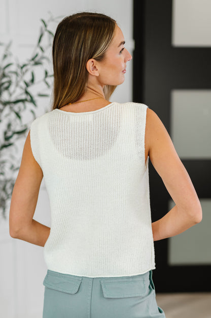 Back view of Lois Tie Front Knit Vest featuring off white knit fabric, sleeveless style, and lightweight fit.