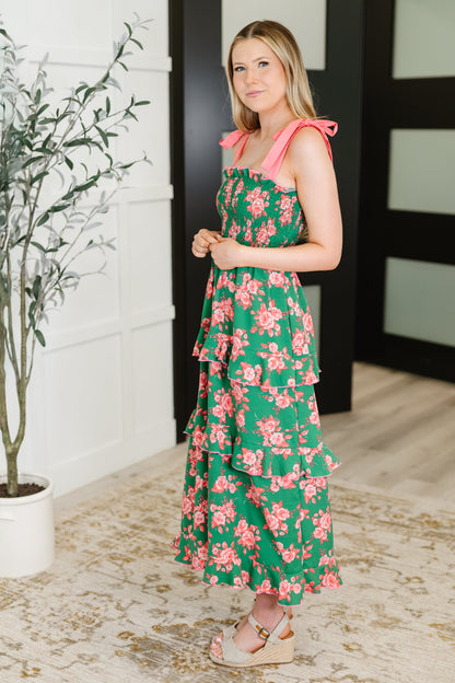 Side view of Lowa Tiered Floral Dress featuring tiered skirt, adjustable straps, and smocked elastic bodice.