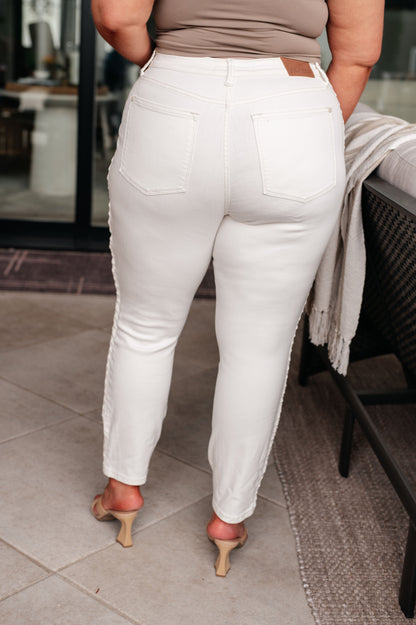 Plus size back view of Maddie Mid Rise Braided Side Seam Jeans in white Judy Blue denim with relaxed fit.