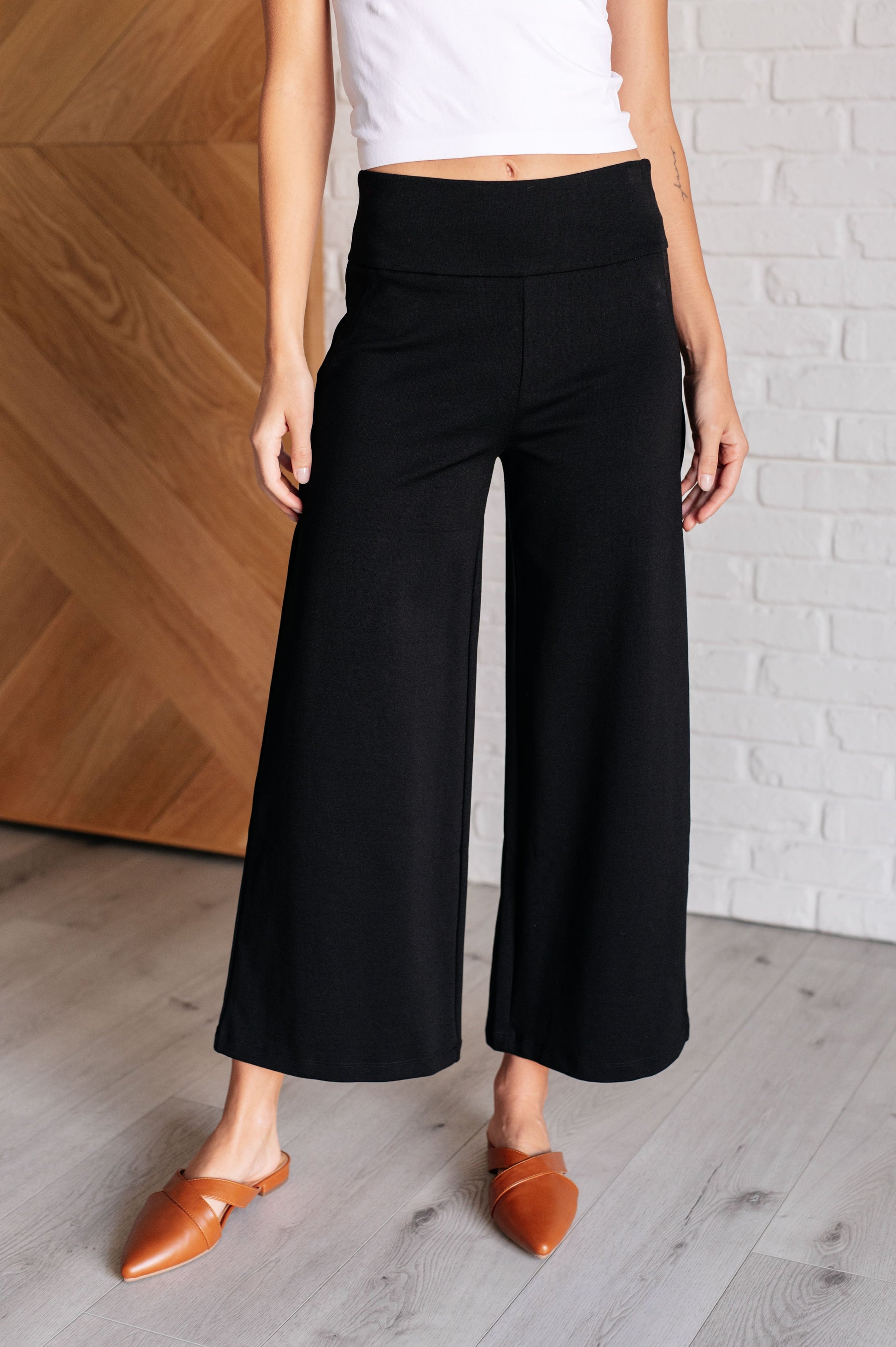 Wide Leg Crop Pants in Black, made of stretchy ponte knit with faux welt pockets, high stretch, and a chic cropped wide-leg design.