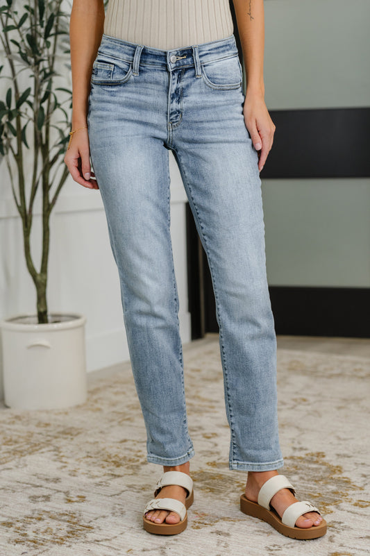 Front view of Judy Blue Mallory Mid Rise Boyfriend Jeans in bleach wash – size inclusive denim with cuffed ankle hem.