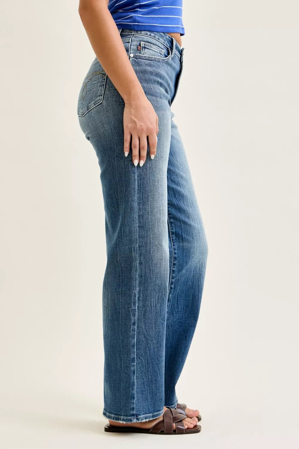 Side view of Mandy Mid Rise 90s Straight Jeans by Judy Blue relaxed straight silhouette.