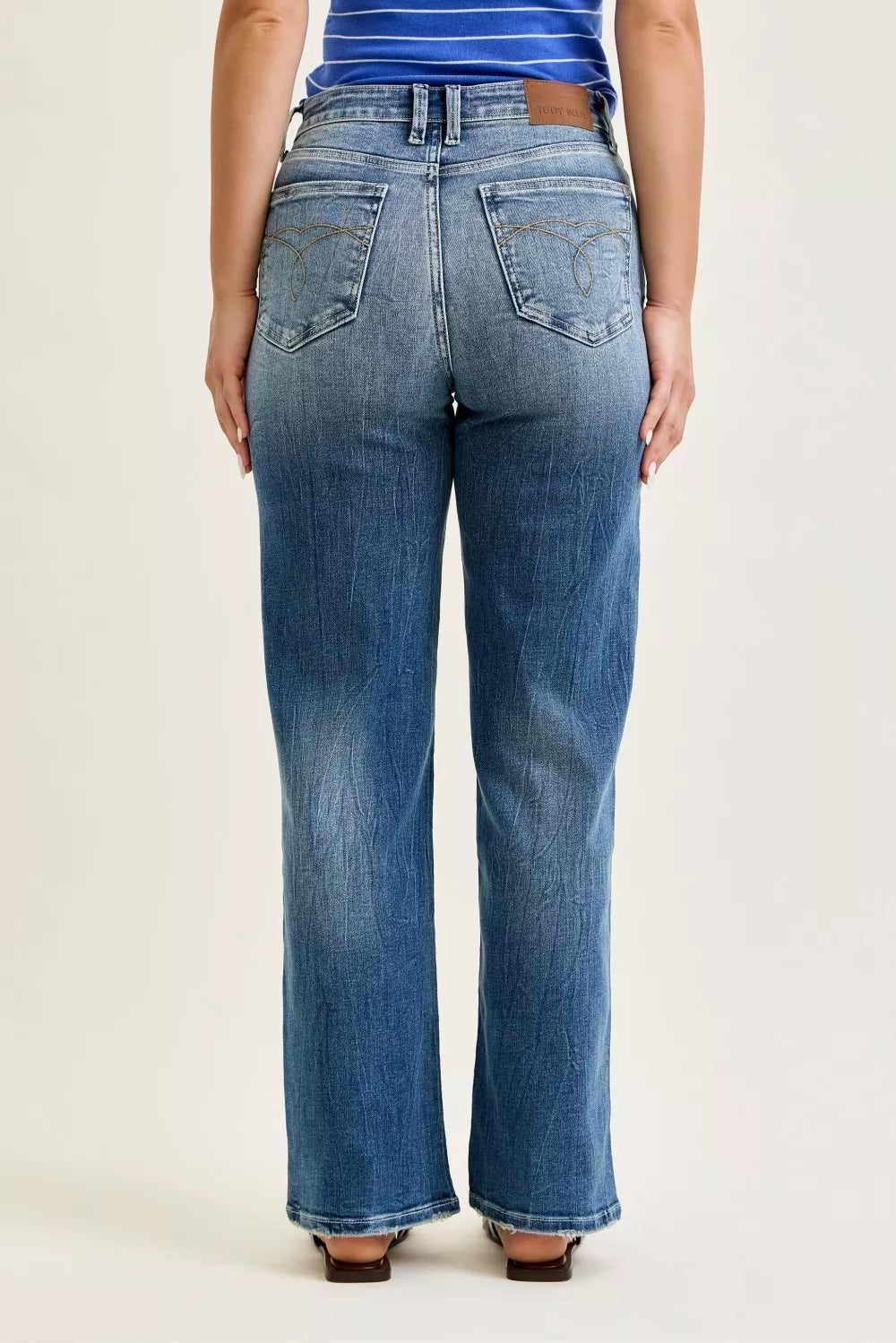 Back view of Mandy Mid Rise 90s Straight Jeans by Judy Blue medium wash denim.