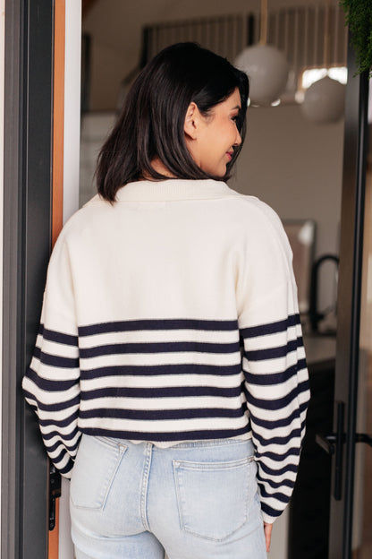 Back view of Octavia Striped Sweater showing relaxed fit and midweight striped knit.