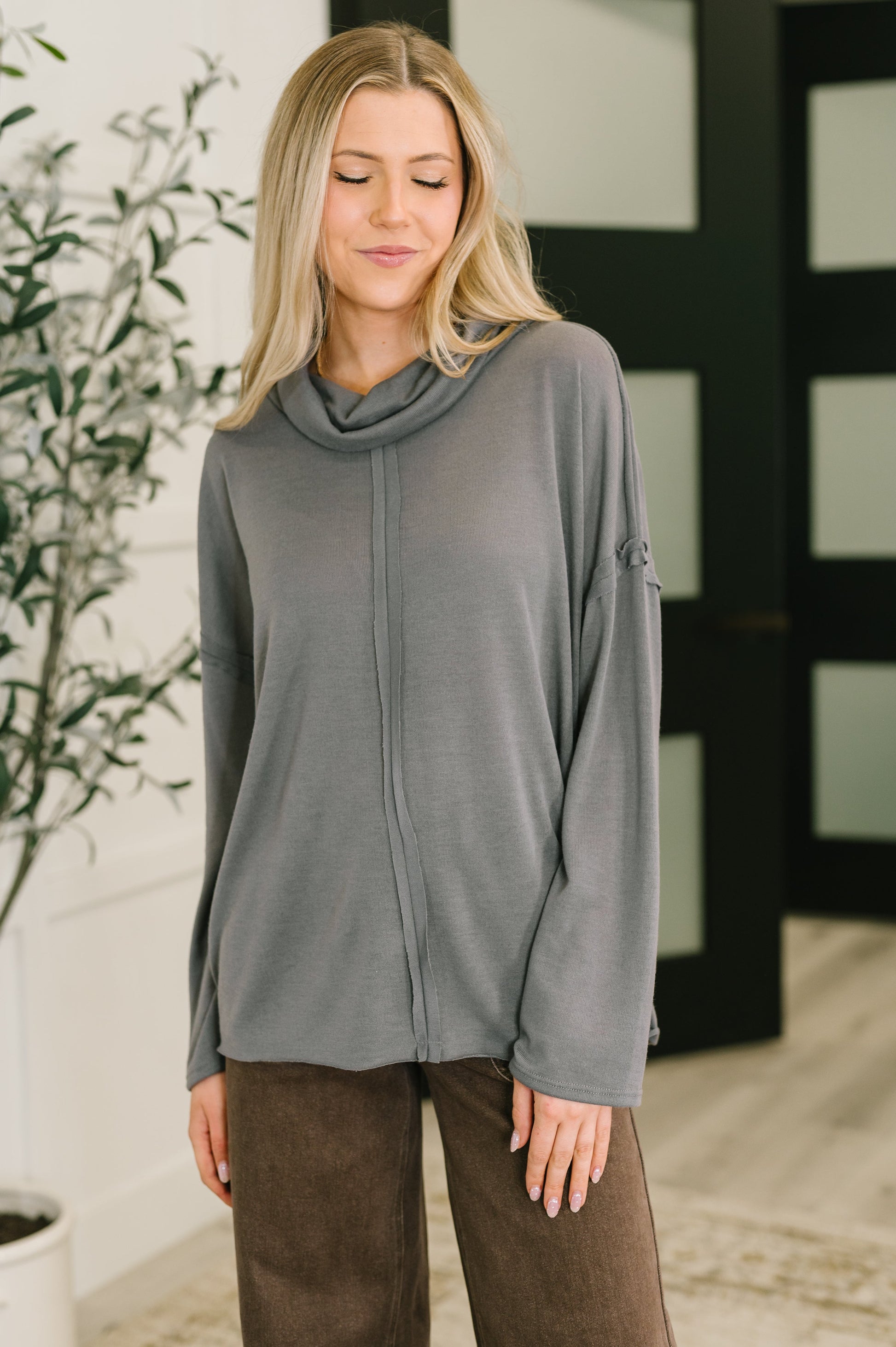 Front view of Melissa Center Seam Turtleneck in gray, relaxed fit
