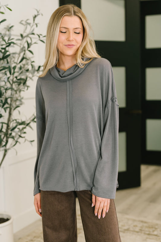 Front view of Melissa Center Seam Turtleneck in gray, relaxed fit