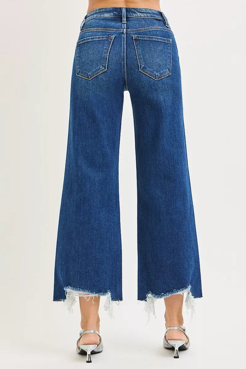 Back view of Molly High Rise Crop Wide Leg Jeans by Risen dark wash denim fit.