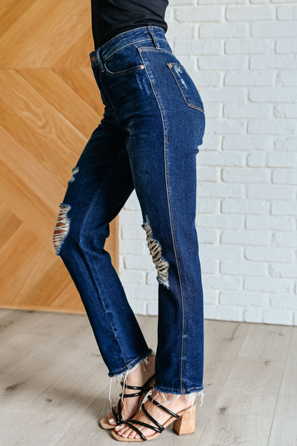 Side view of Montana Distressed High Rise Straight Leg Jeans in dark wash.
