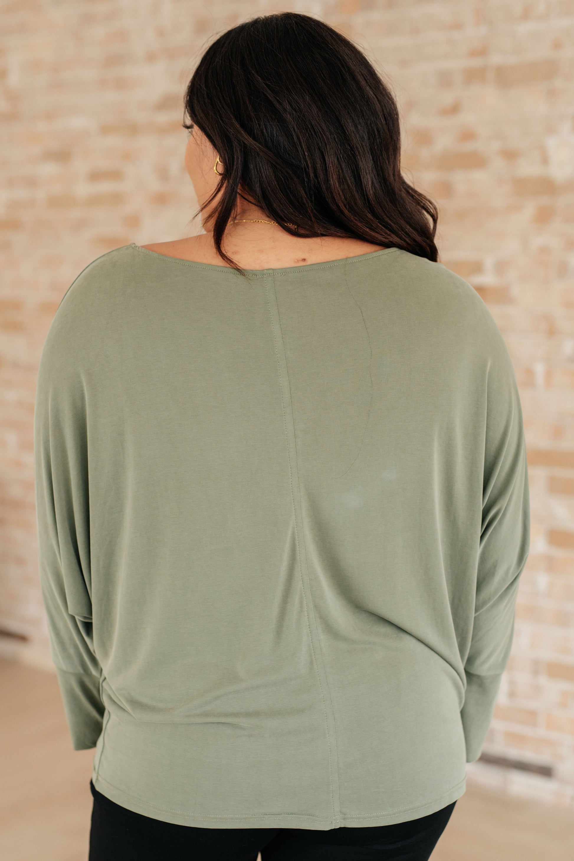 Plus size back view of Micah Sage Long Sleeve Top showing smooth brushed fabric and relaxed silhouette