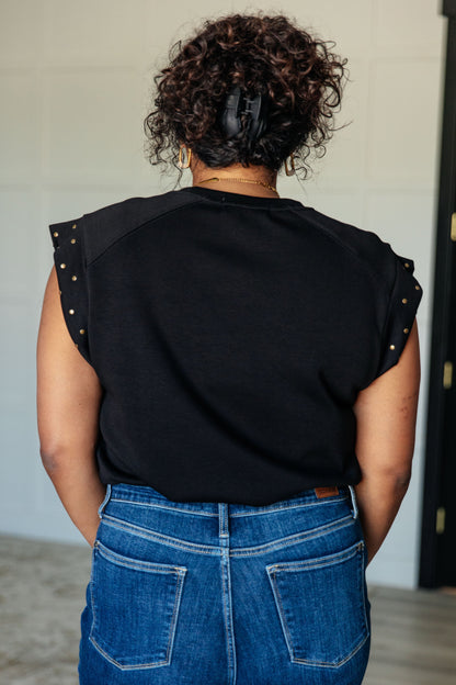 Plus size model back view in Myla Studded Cap Sleeve Top highlighting sleek fit and cap sleeves.