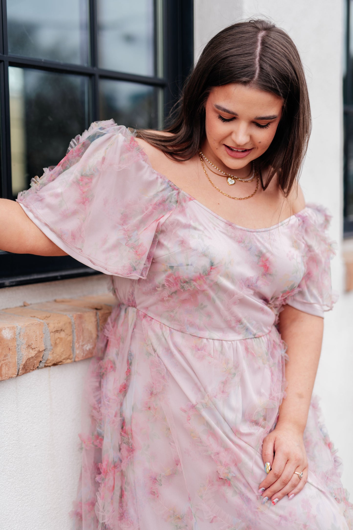 Plus size front view of Malia Flutter Sleeve Dress with V-neckline and fully lined floral tulle