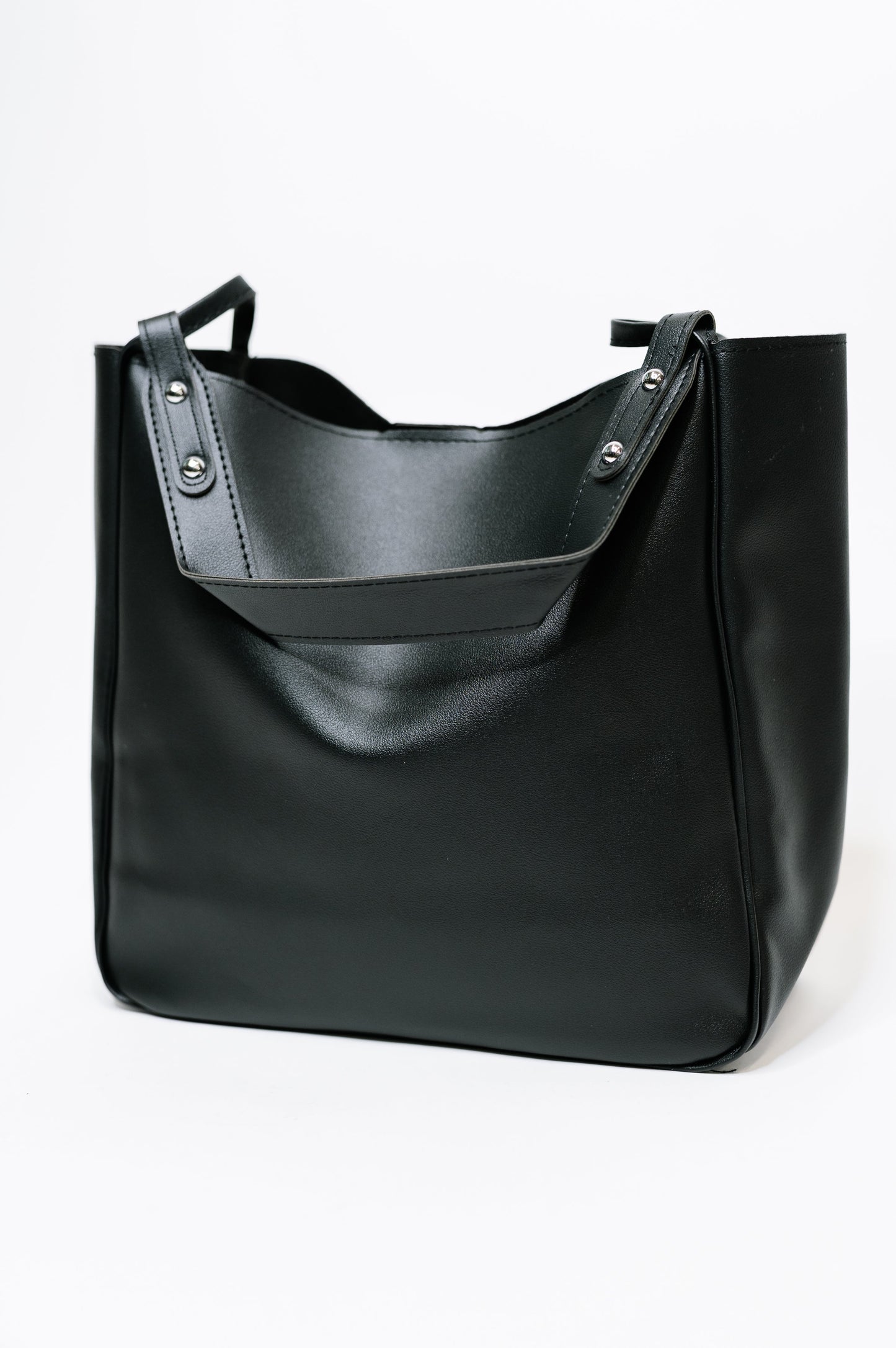 Front view of My Whole Life Shoulder Bag in Black showing sleek design and shoulder strap.