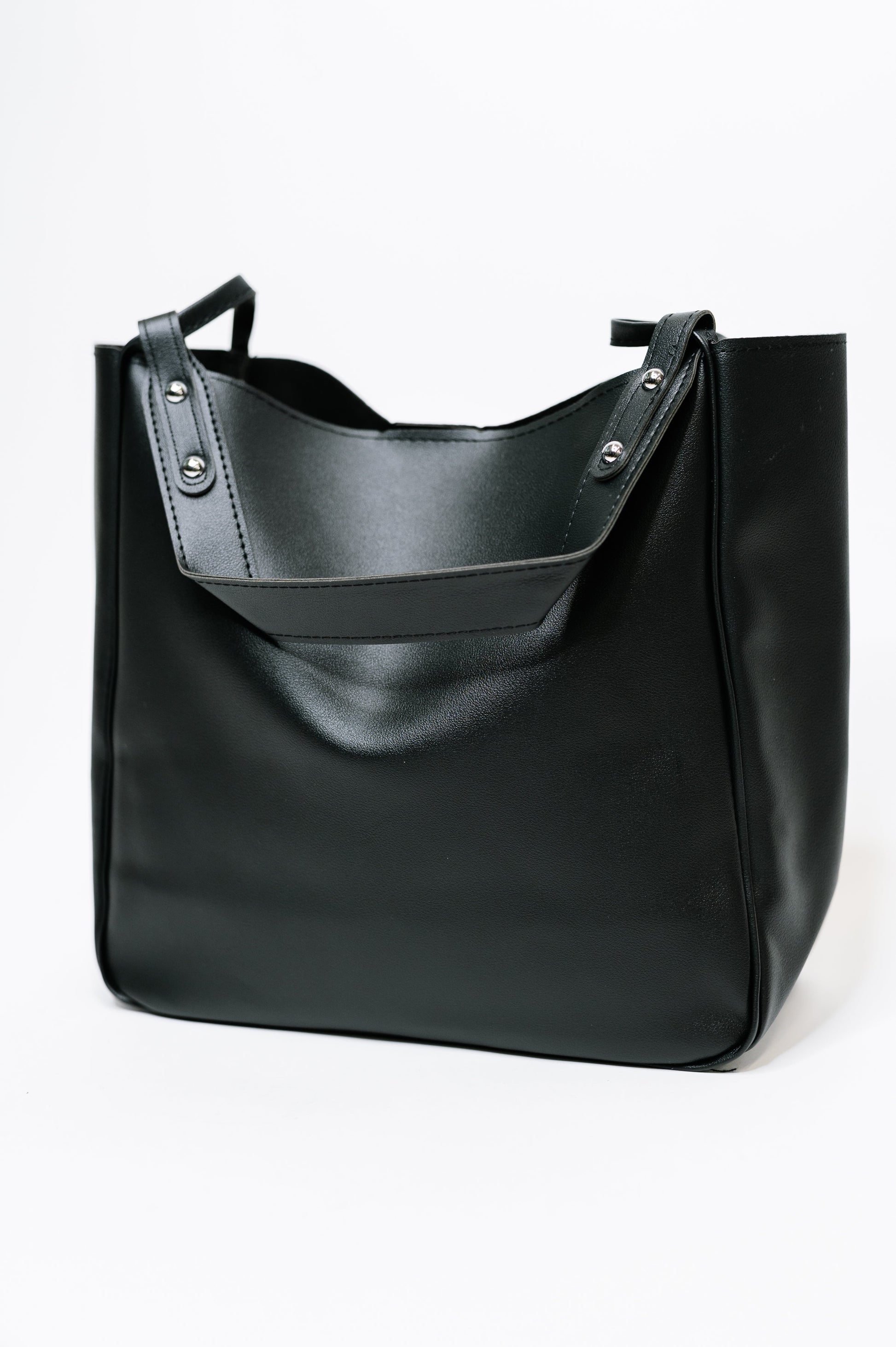 Front view of My Whole Life Shoulder Bag in Black showing sleek design and shoulder strap.