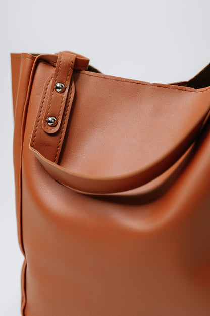 Close-up of My Whole Life Shoulder Bag in Camel showcasing shiny silver hardware details.