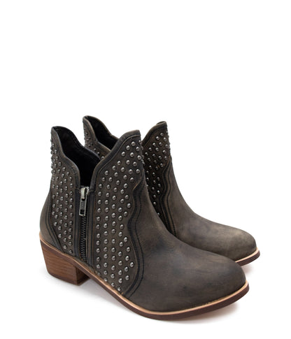 Front angle of Nellie Studded Ankle Boots in black leather, highlighting edgy studded design.