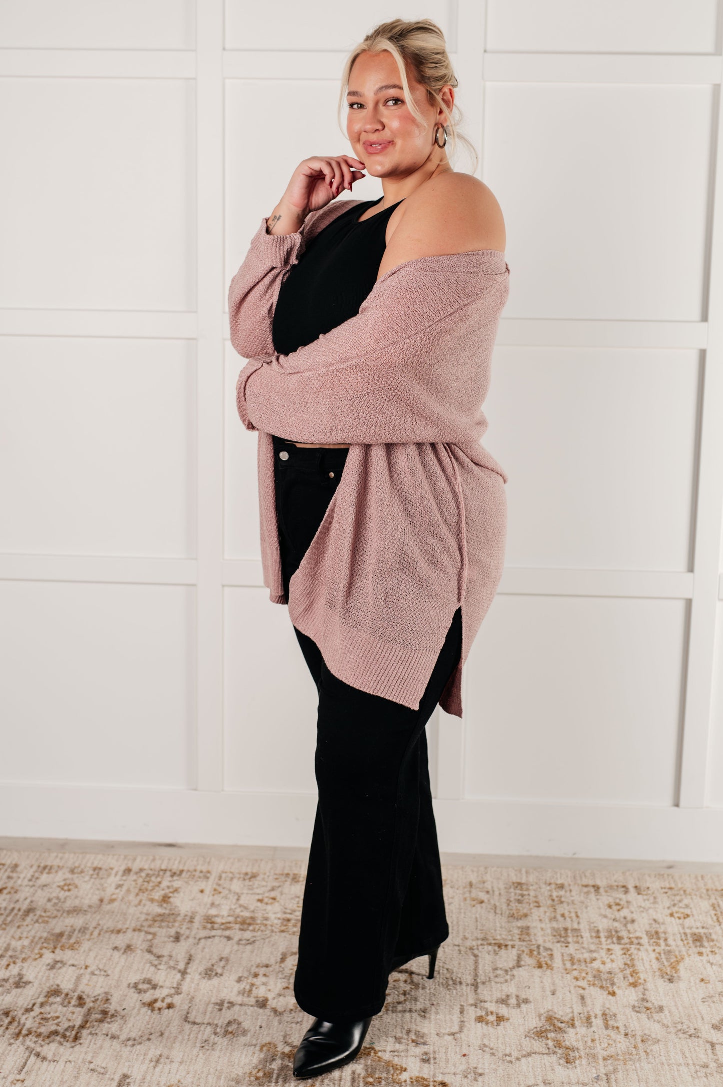 Nevina Cardigan in dusty pink, loose knit open front sweater with dolman sleeves, tacked cuffs, side slits, and banded ribbed trim. Cozy and stylish addition to your wardrobe.