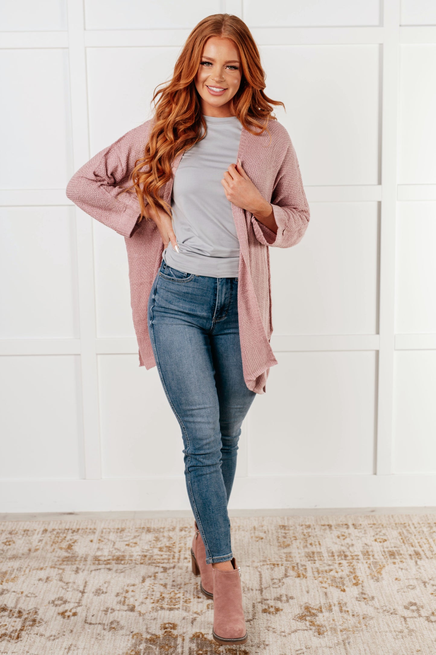 Nevina Cardigan in dusty pink, loose knit open front sweater with dolman sleeves, tacked cuffs, side slits, and banded ribbed trim. Cozy and stylish addition to your wardrobe.