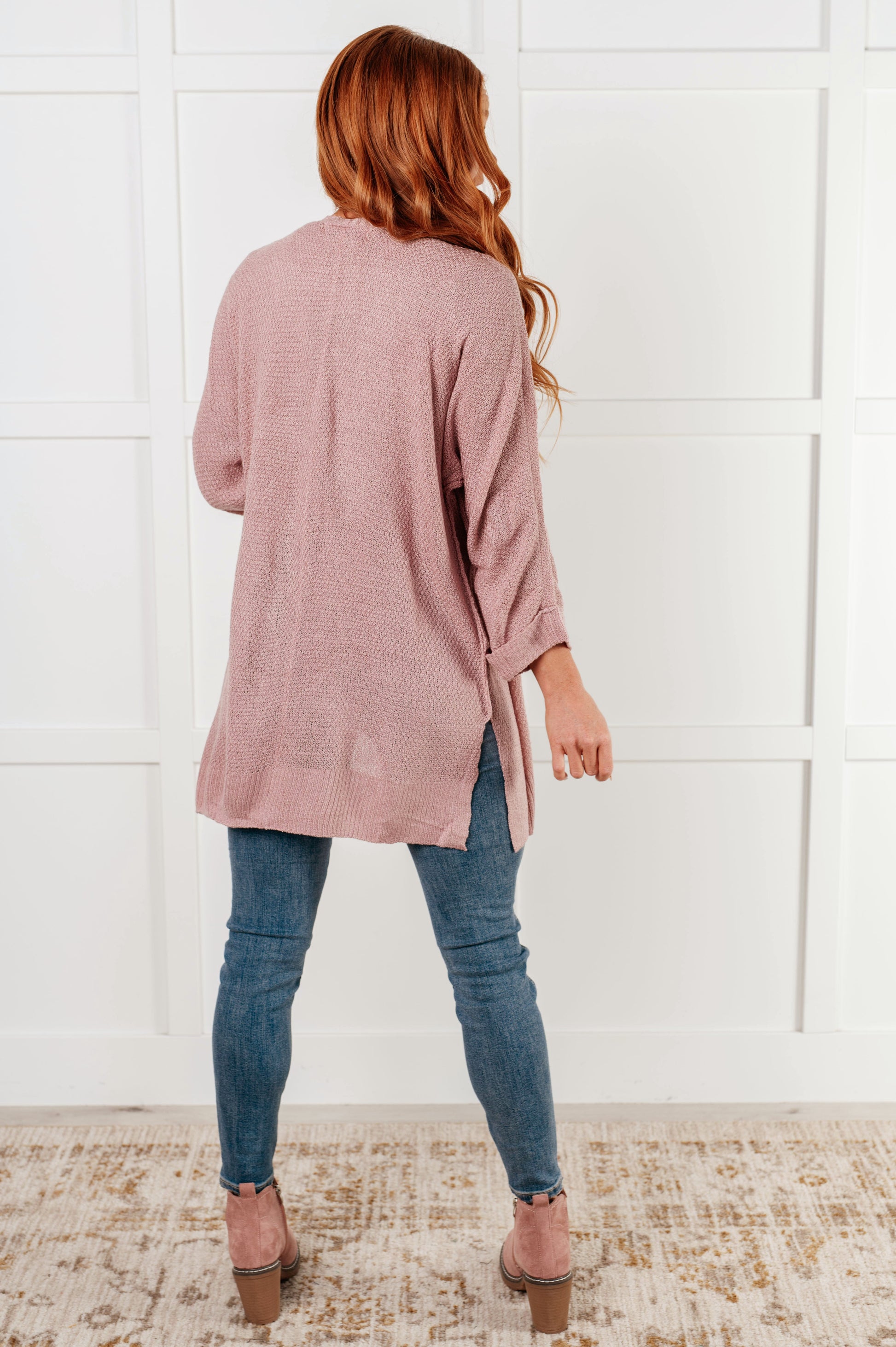 Nevina Cardigan in dusty pink, loose knit open front sweater with dolman sleeves, tacked cuffs, side slits, and banded ribbed trim. Cozy and stylish addition to your wardrobe.