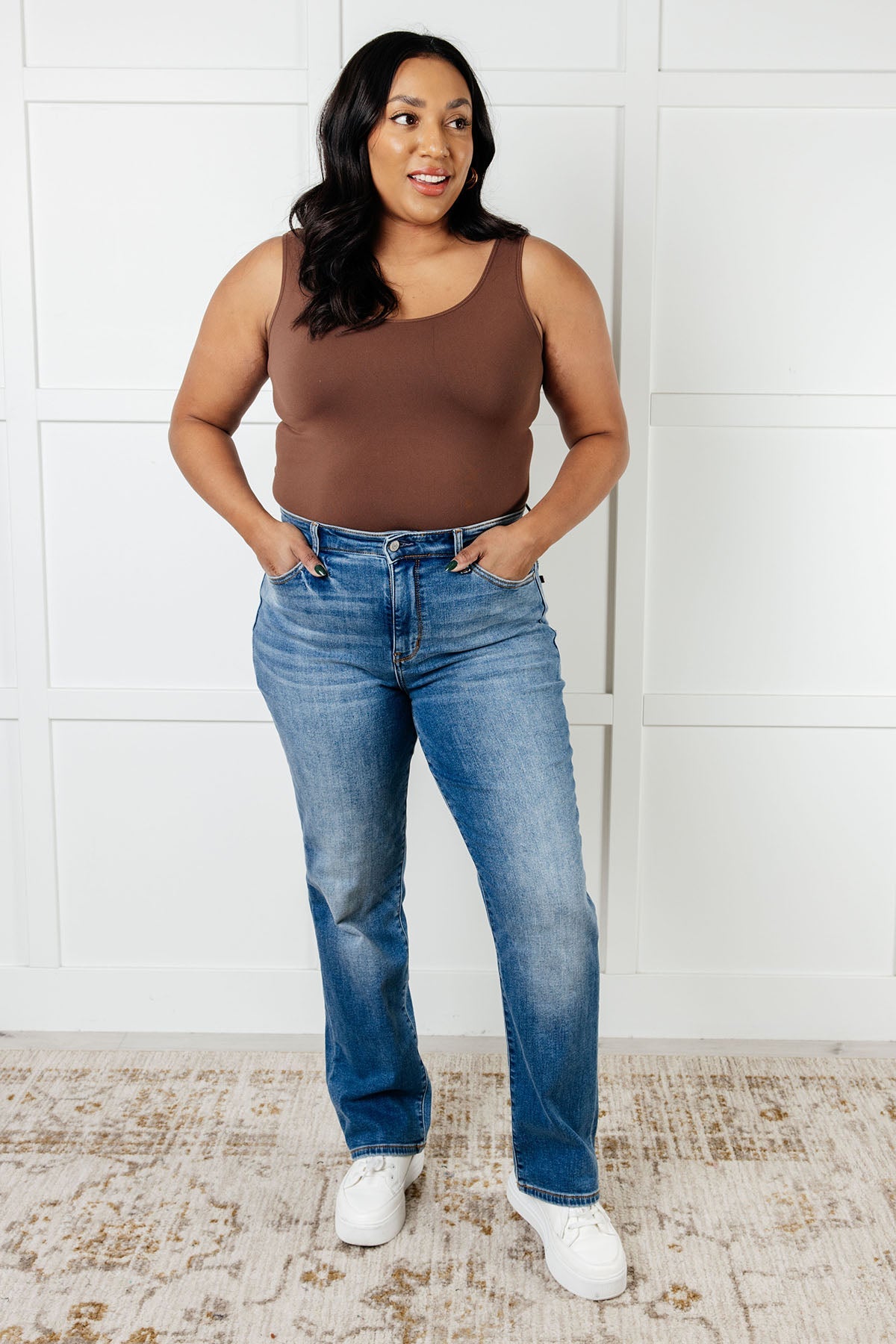 Nivea Vintage Wash Thermal Straight Jeans with a high-rise fit, brushed thermal liner, vintage wash, and straight leg silhouette for warmth and style.