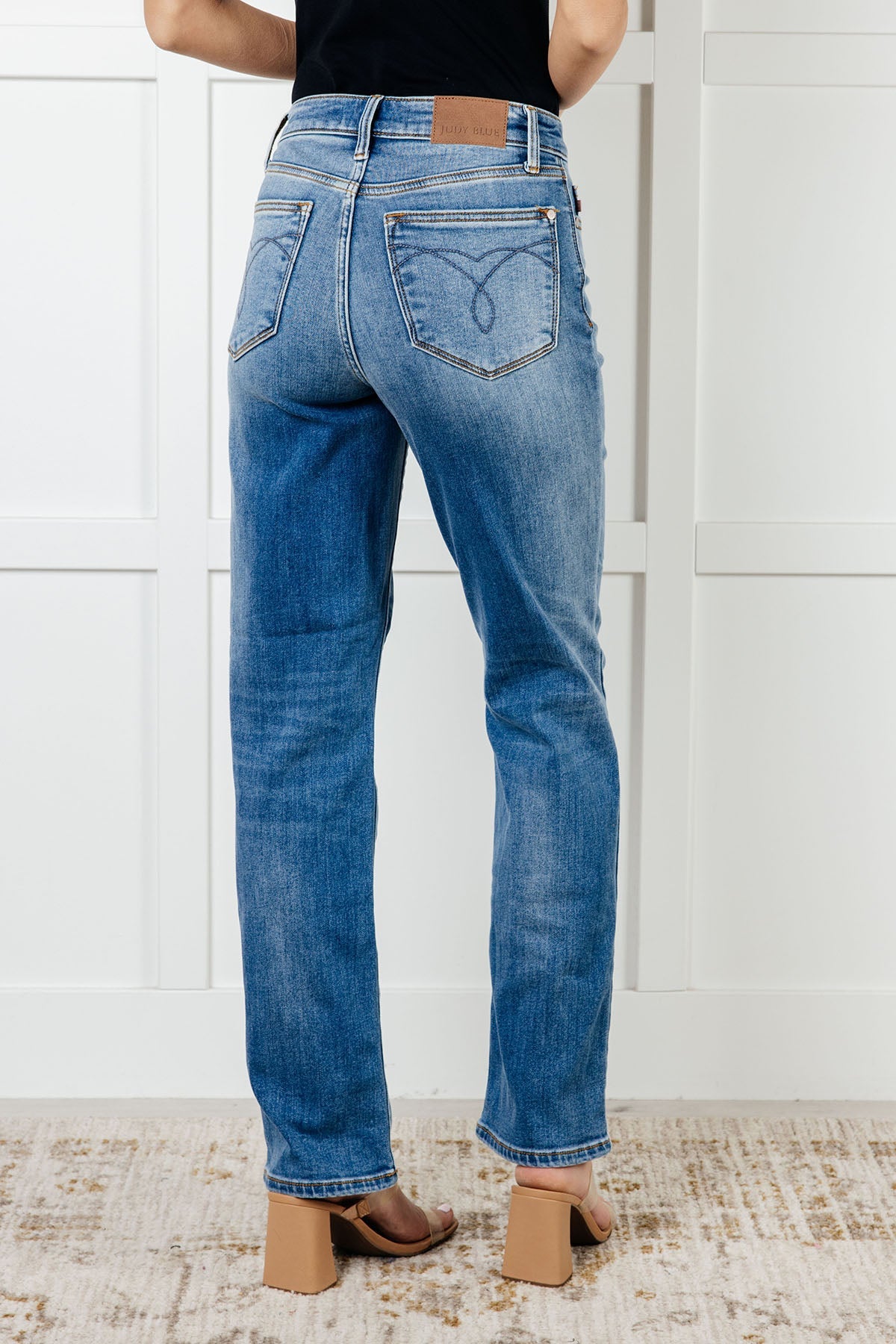 Nivea Vintage Wash Thermal Straight Jeans with a high-rise fit, brushed thermal liner, vintage wash, and straight leg silhouette for warmth and style.