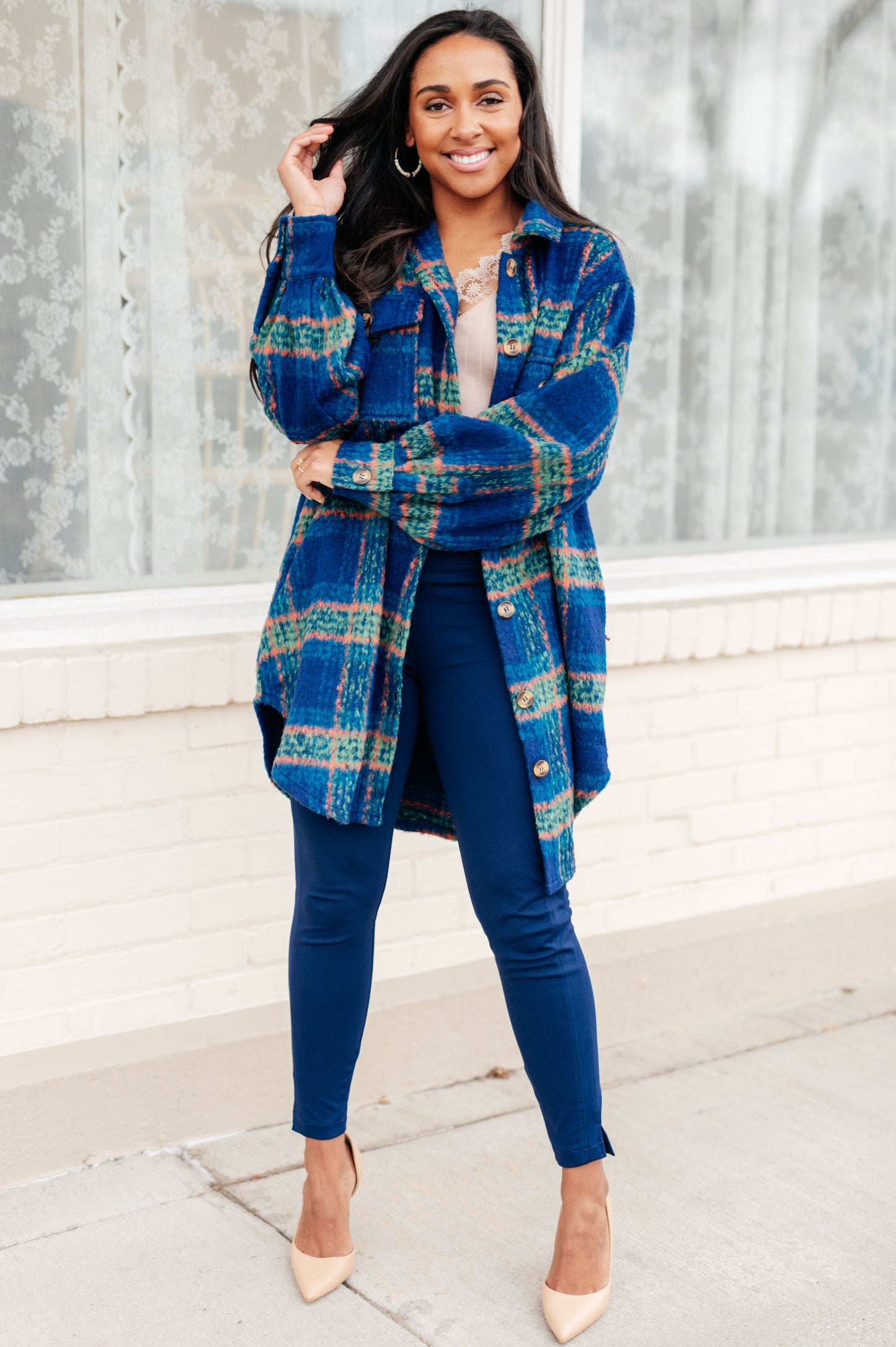 Front view of Nona Plaid Coat showing large blue plaid pattern and breast pockets.