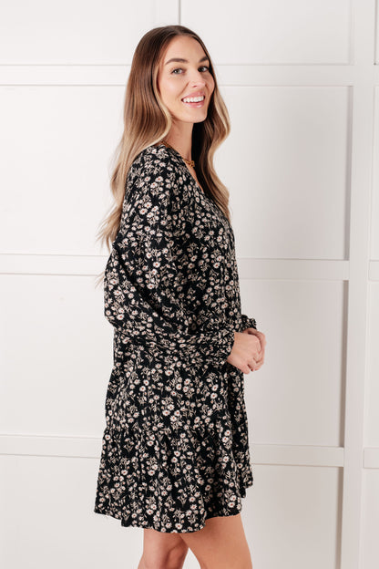 Side angle of Onna V-Neck Floral Dress highlighting long balloon sleeves.