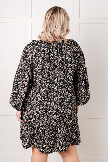 Back view of plus size Onna V-Neck Floral Dress showing lined mini-length design.