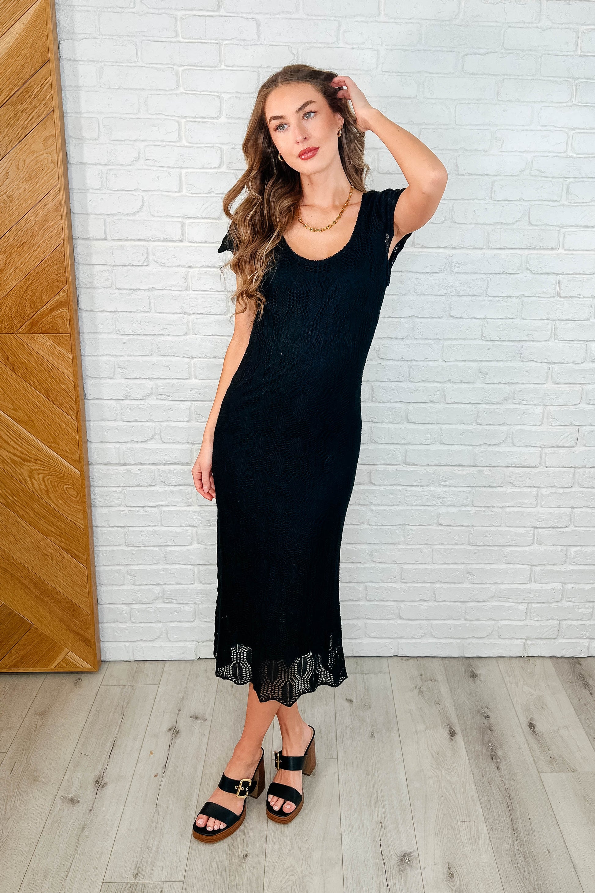Otis Black Lace Dress crafted from soft sweater knit fabric with a scoop neckline, cap sleeves, and a comfortable lined interior for all-day wear.