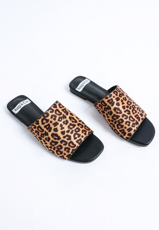 Front view of Everyday Panthera Leopard Print Slider Flats showing open square toe detail.