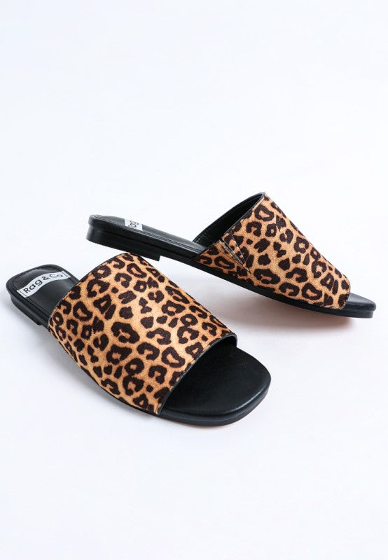Angled view of Everyday Panthera Leopard Print Slider Flats modern square toe silhouette.