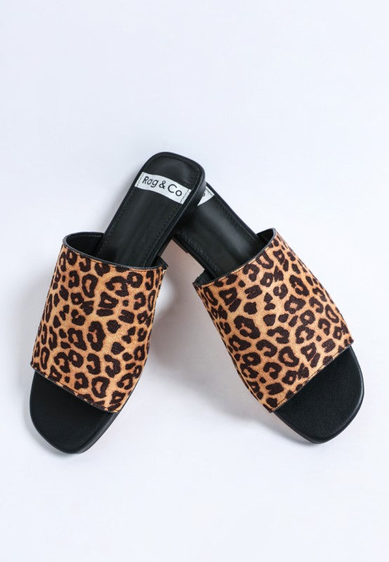 Flat lay of Everyday Panthera Leopard Print Slider Flats stylish slip on flats.