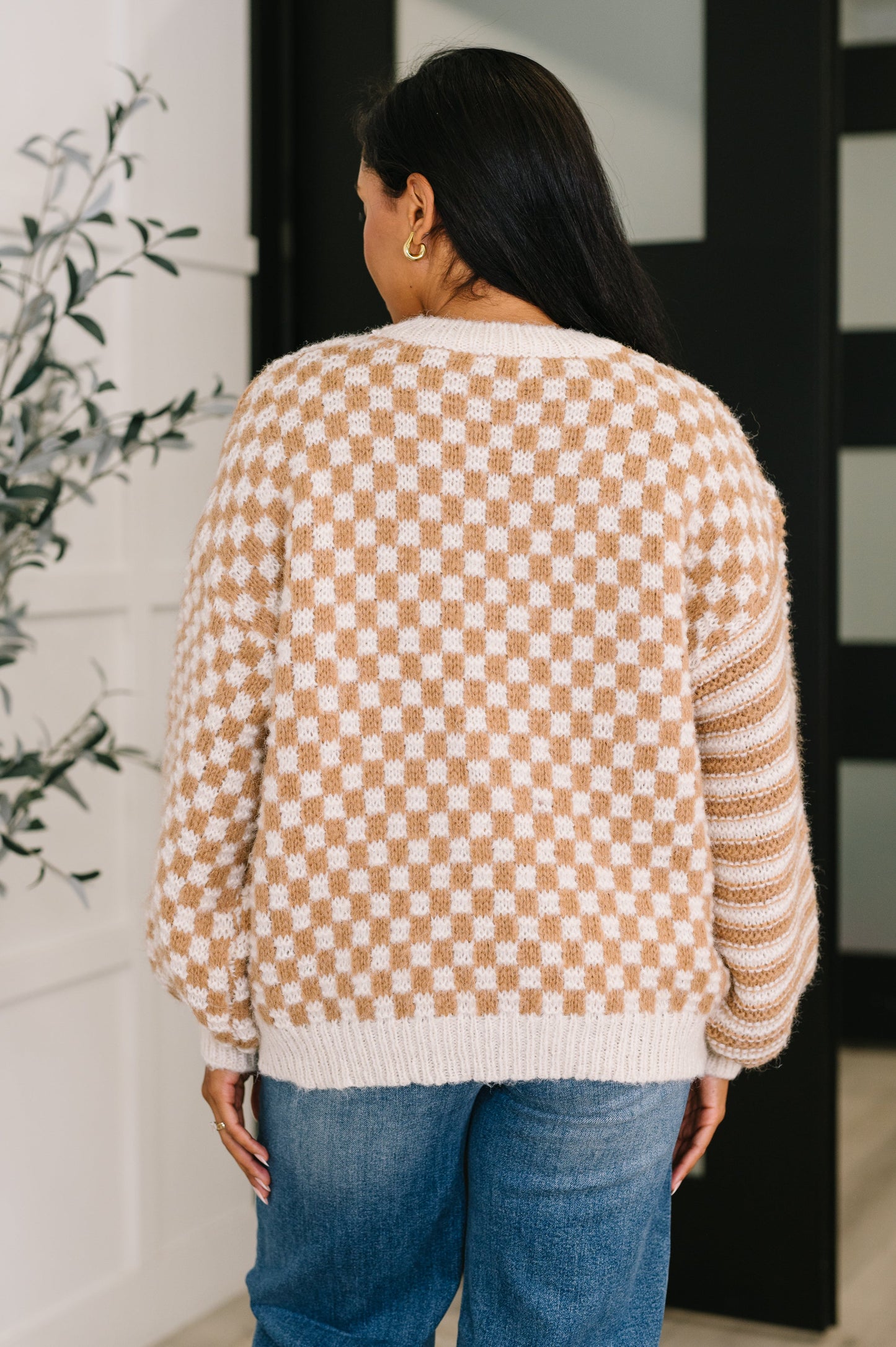Back of Matilda Oversized Pullover featuring taupe and cream checkered pattern.