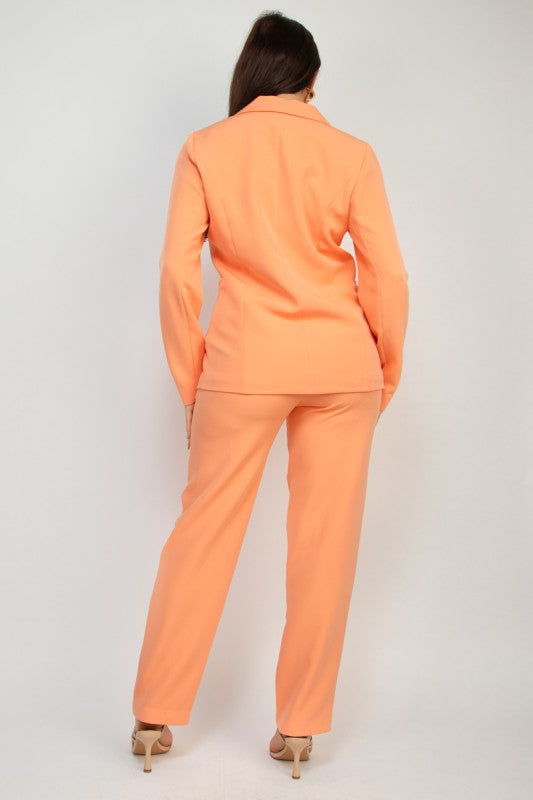Peach tailored pantsuit with collared blazer and straight leg trousers, back view.