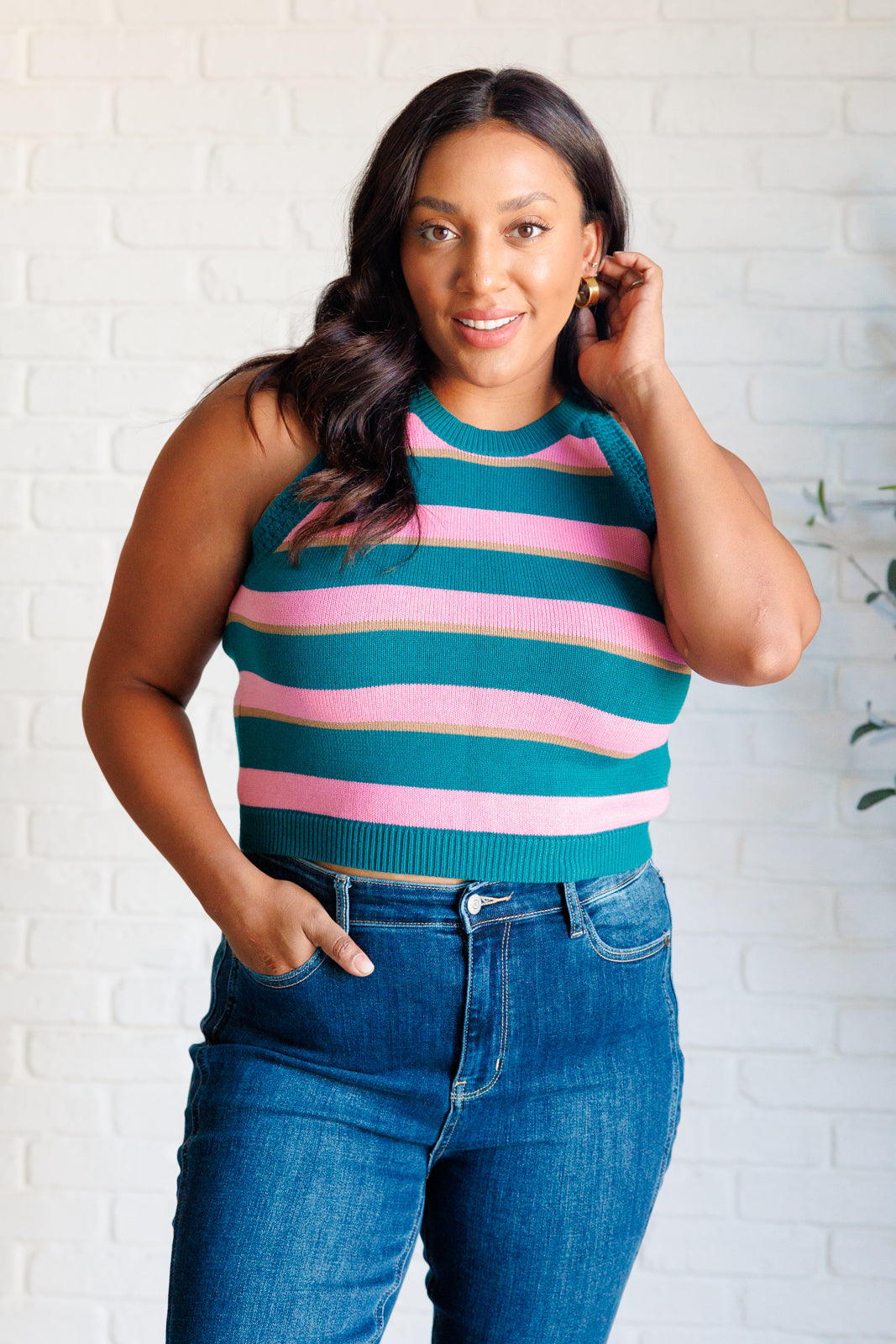 Plus size model wearing Percy Knit Striped Tank pink and teal striped knit tank.
