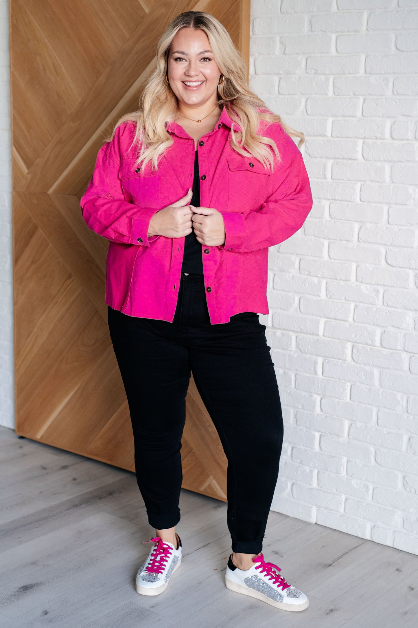 Plus Size pink lightweight corduroy jacket with a collared neckline, long sleeves, button-front closure, and buttoned patch pockets. Boyfriend fit for a relaxed look.