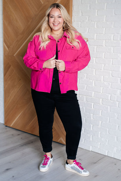 Plus size model layering Poppy Pink Jacket over a tee for a casual look.