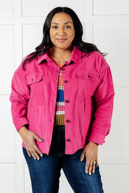 Plus size model wearing Poppy Pink Jacket in lightweight pink corduroy.