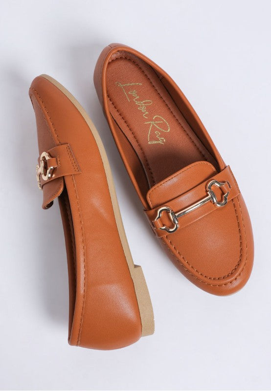 Close up of Pingle Horsebit Faux Leather Loafers in Tan smooth faux leather texture.