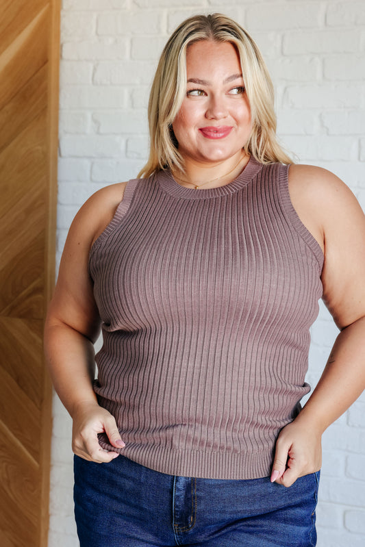 Plus size model wearing Lenny Ribbed Sweater Tank in brown knit with round neckline and body-hugging ribbed fit.