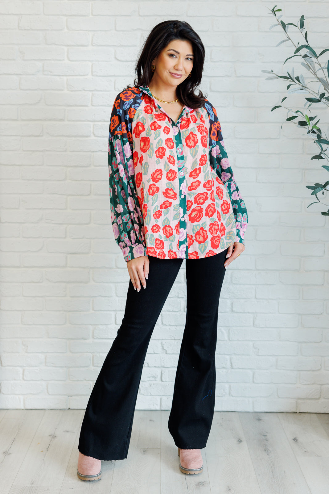 Priscilla Mixed Print Blouse with multicolor block color floral prints, high neckline, front button closures, balloon sleeves with banded cuffs, and playful ruffle detailing.