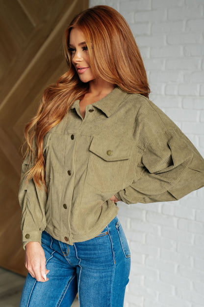 Side profile of Laylah Olive Corduroy Jacket, lightweight corduroy with collared neckline and button cuffs