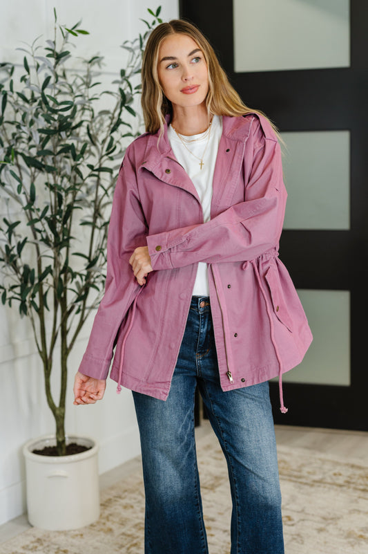 Front view of Puddle Jumper mauve jacket with zip and snap closure