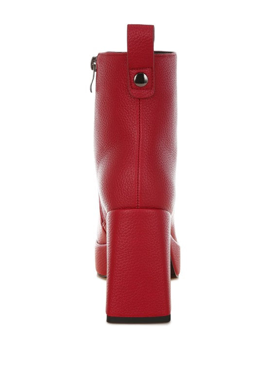 Red Poulin Faux Leather Chelsea Boots close-up of striking square toe design.