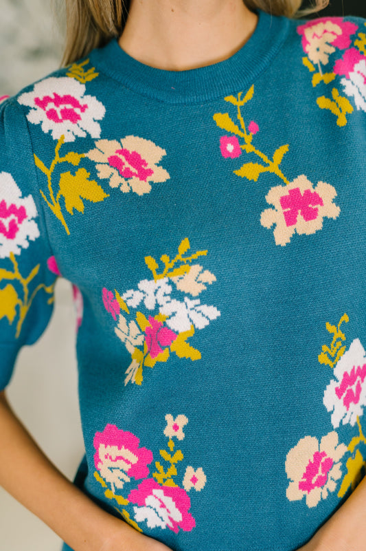 Close up of Riley Floral Knit Top floral design and gathered shoulder detail.
