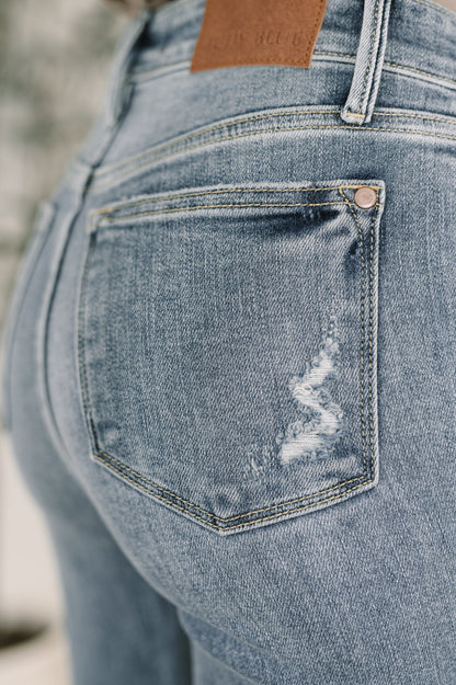 Robin High Waist Bootcut Jeans close up of back pocket.