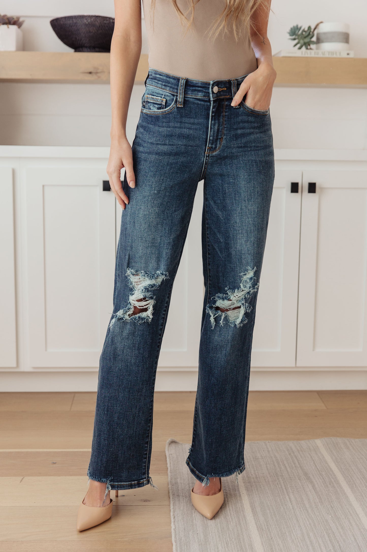 Judy Blue Rose High Rise 90's Straight Jeans in dark wash, featuring a zip fly, distressing, chewed hems, and 4-way stretch for a flattering fit.