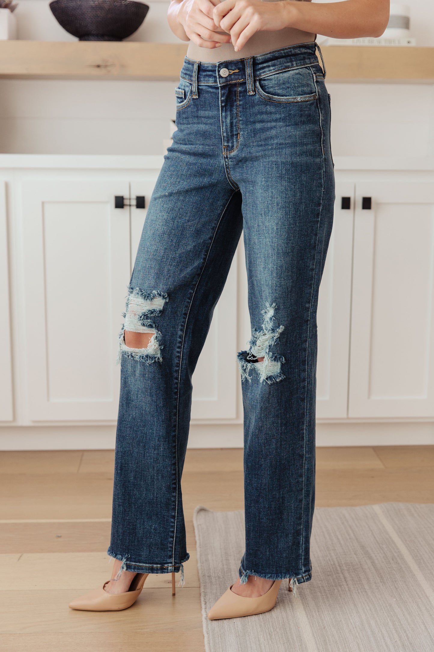 Judy Blue Rose High Rise 90's Straight Jeans in dark wash, featuring a zip fly, distressing, chewed hems, and 4-way stretch for a flattering fit.