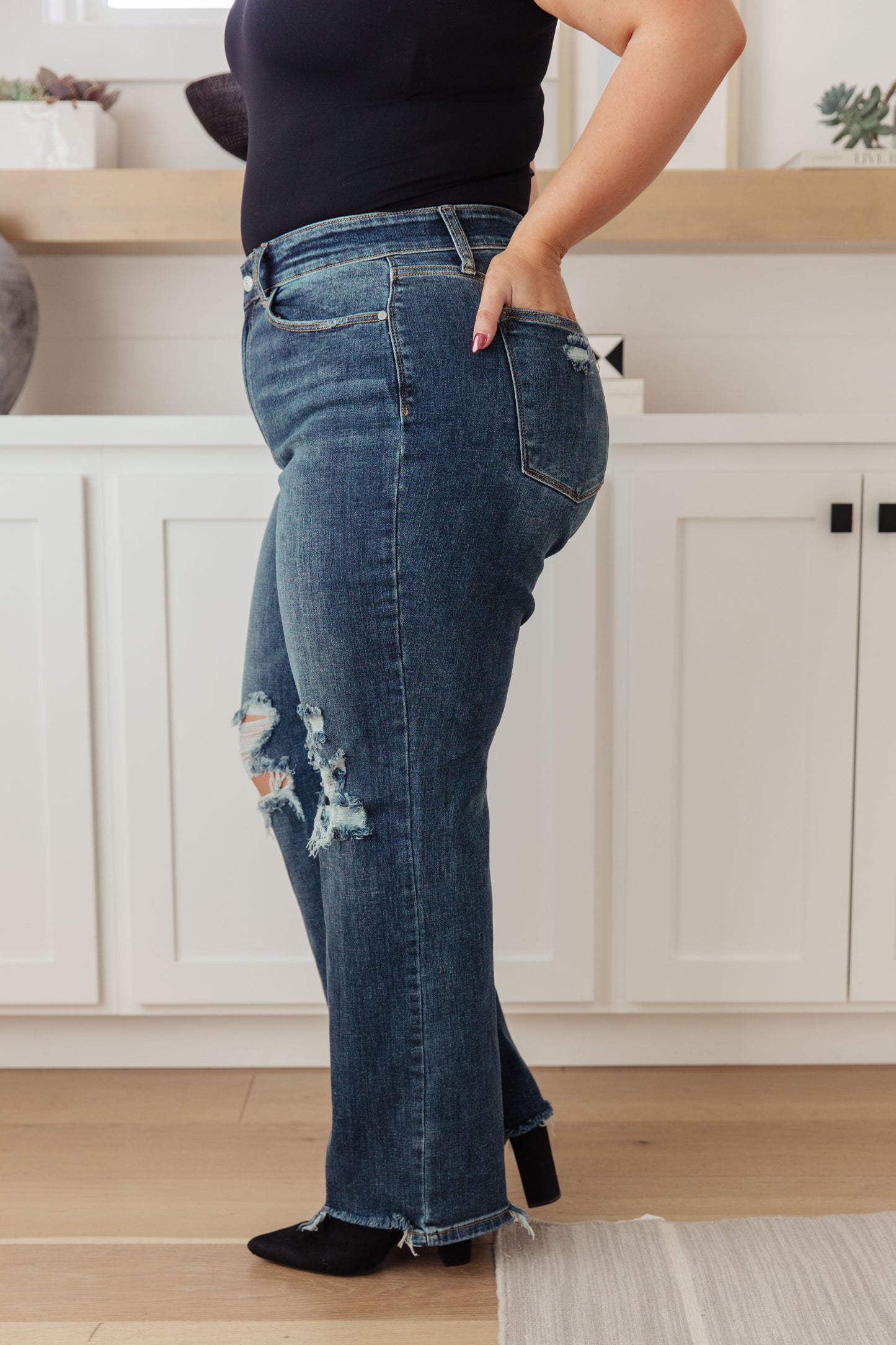 Judy Blue Rose High Rise 90's Straight Jeans in dark wash, featuring a zip fly, distressing, chewed hems, and 4-way stretch for a flattering fit.